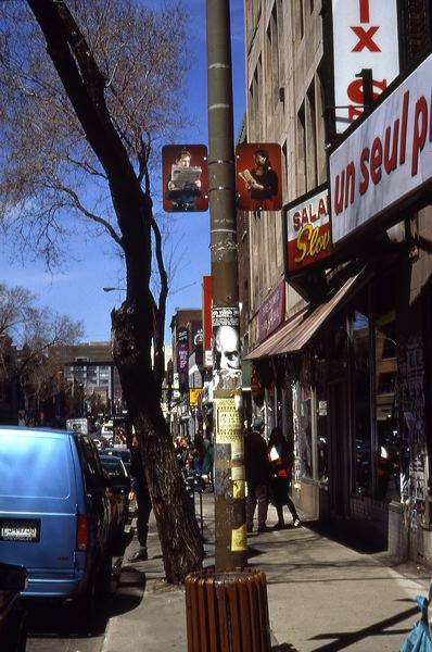 traffic sign installation with photos mounted on traffic sign postes