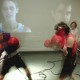 <i>ASCII Fighter (BOX) </i> – View of Sorry clips from Video Fighter section of BOX performed at Le Locale, Montreal										, 2004<span class='photo-credit'> – Photo: <a href='https://www.linkedin.com/pub/jerome-bourque/48/76b/649' target='_blank'>Don Goodes</a></span>										 <a href='https://paullitherland.com/artsite_wp/wp-content/uploads/PaulLitherland_2004_ASCIIFighter_photoGuyLHeureux01.jpg' target='_blank'><img src='https://paullitherland.com/artsite_wp/wp-content/themes/artpress-child/img/artworkDownloadImg.png' title='télécharger image / download image' /></a> 		
																				